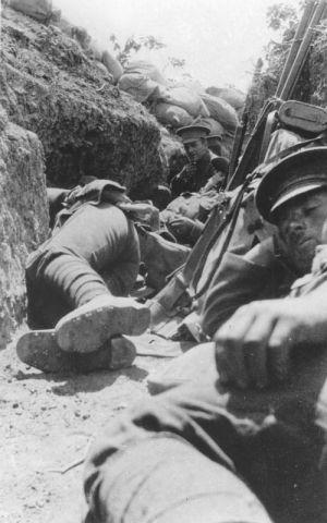 New Zealand Soldiers resting in a trench